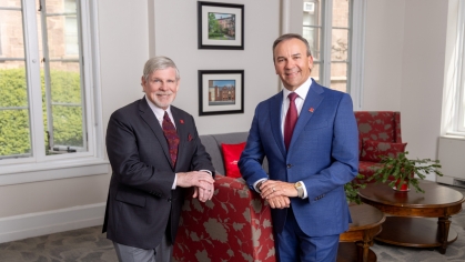 Phil Scalo RC’75, NLAW’78, at left, and Roberto Muñiz LC’82, SPAA’90.